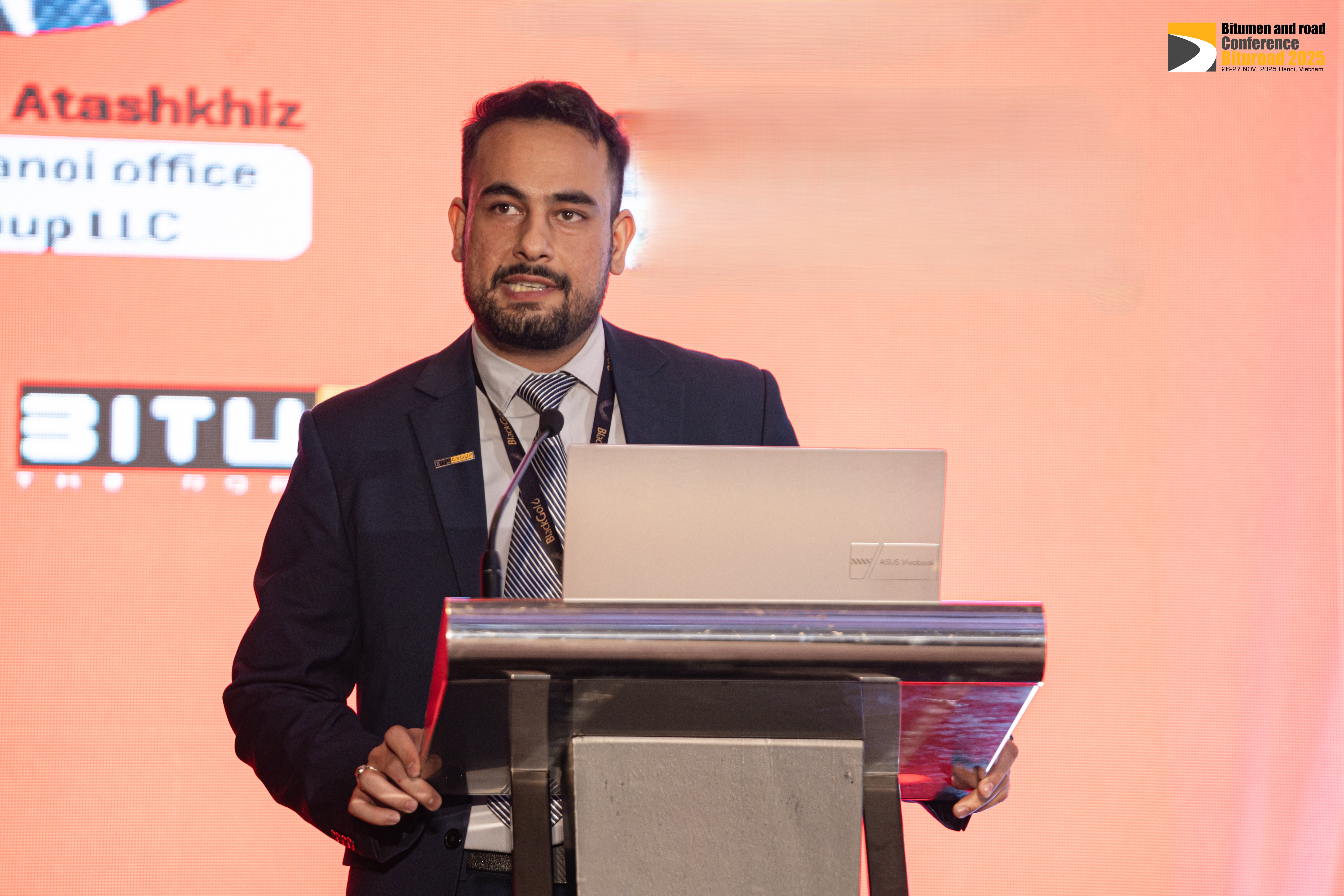 Alireza Atashkhiz, Event Manager at BituGroup, speaking at Bituroad 2025 in Hanoi.