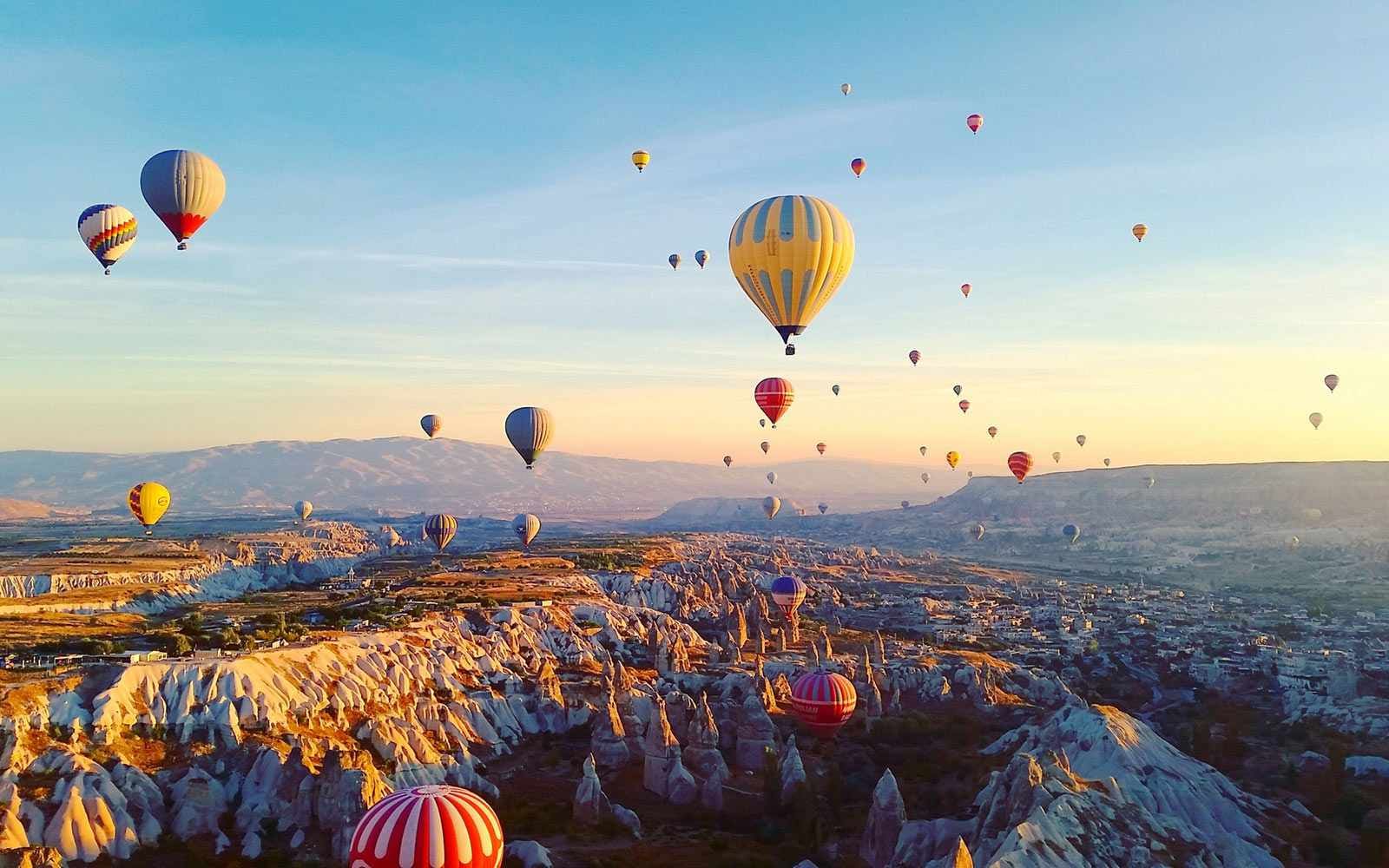 Above the Fairy Chimneys: A Morning in Cappadocia's Balloons