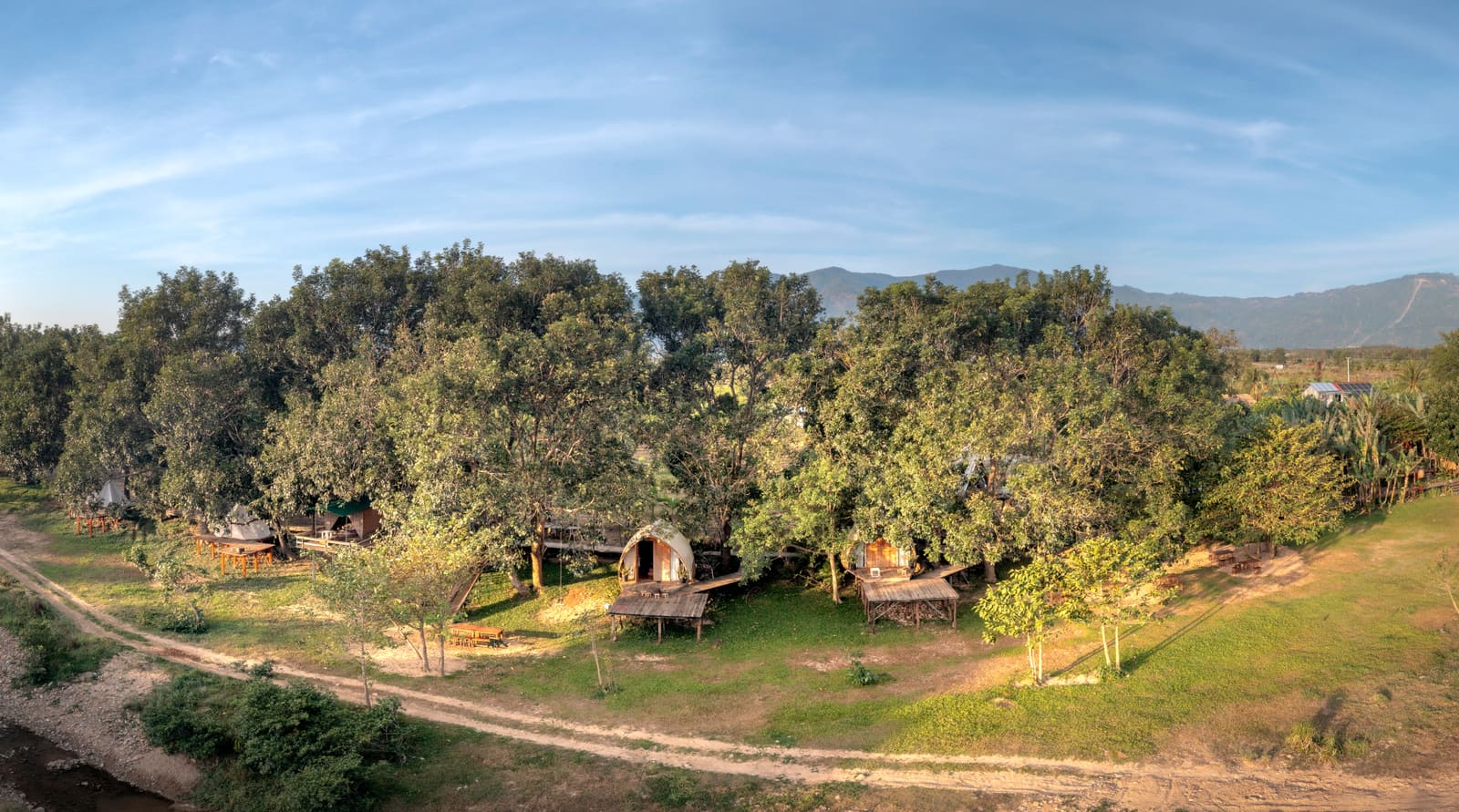 Where Elephants Linger at the Gates and Suites Float Above the River