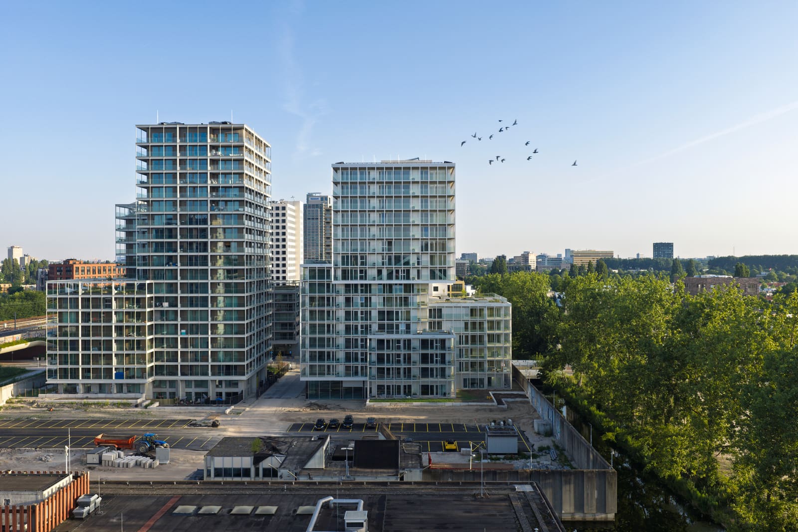 Four Interlocking Volumes Redefine Amsterdam's Former Prison Site