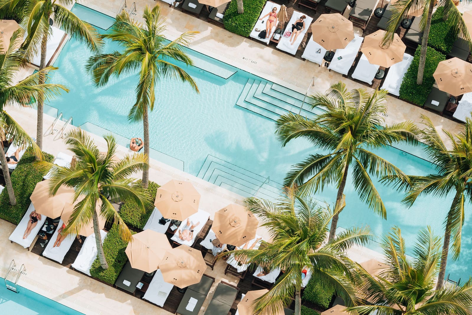 Where Art Deco Shadows Fall Across Infinity Pools