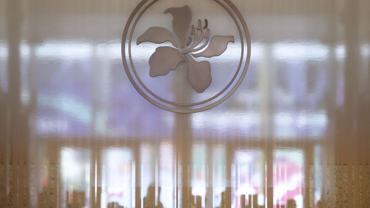 Hong Kong's Dollar Peg Faces Fresh Scrutiny Amid Yuan Rise