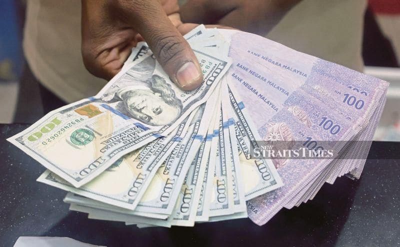 Malaysia's Ringgit Slides Against Dollar as Markets Brace for US Inflation Data