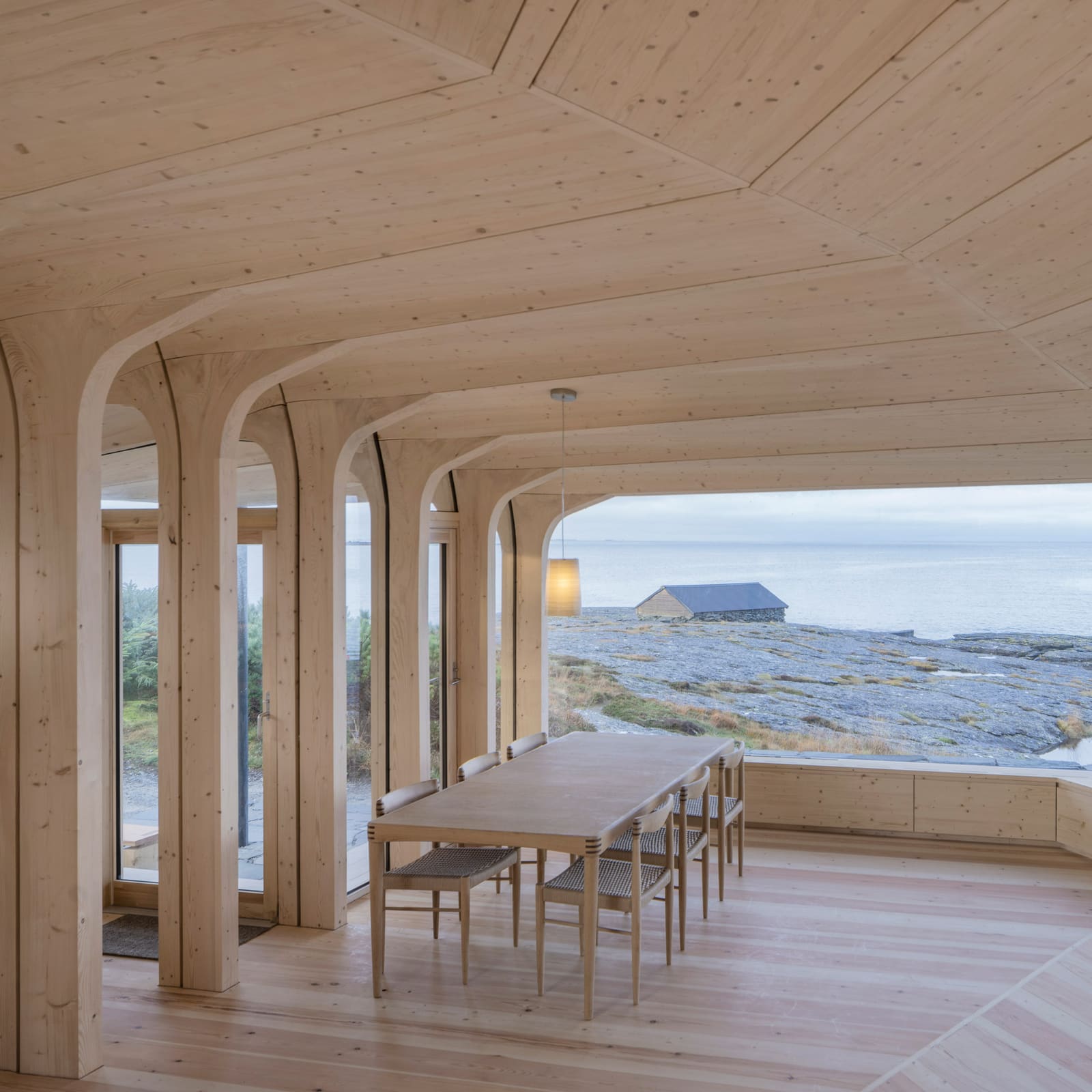 When Architecture Grows From the Ground: A Norwegian Cabin Built Around Uprooted Trees
