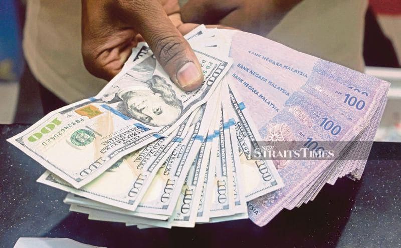 Ringgit Strengthens Against Dollar as Markets Brace for US Payrolls