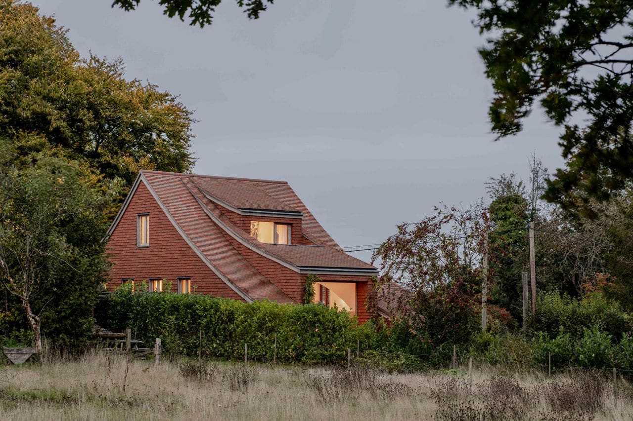 Templeton Ford Buries a Brick Home Into the Sussex Landscape