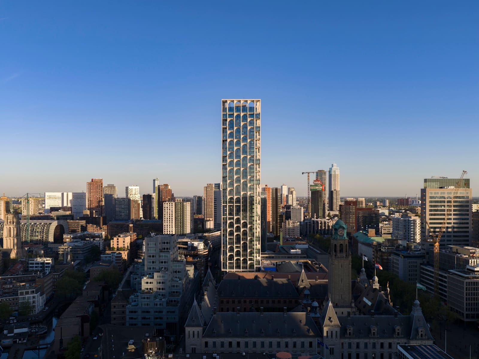A Tower Rises Behind Rotterdam's Last Monument to Survival