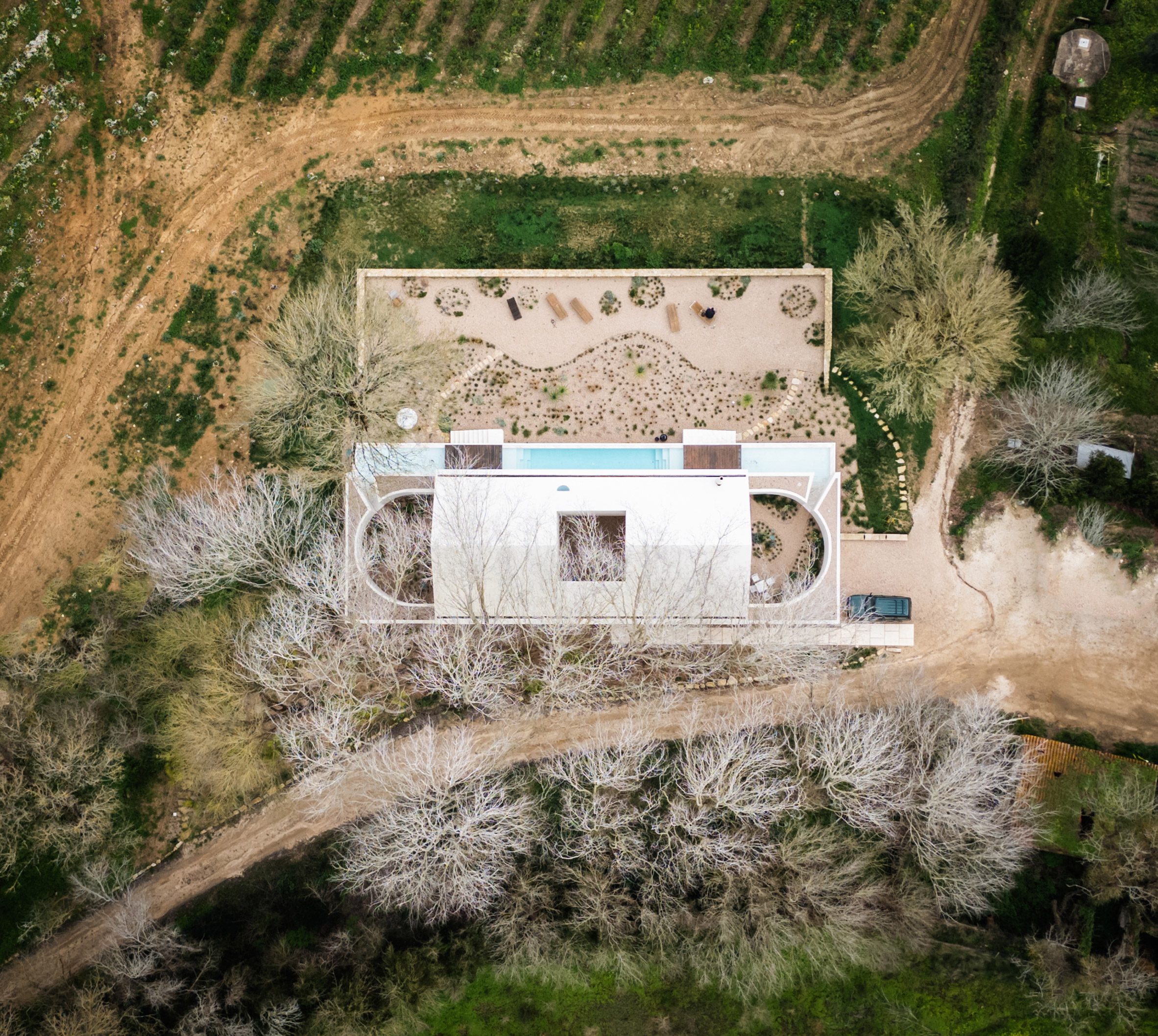 Symmetry In Sound: A Winery Reborn As A Minimalist Home And Studio For Two Musicians