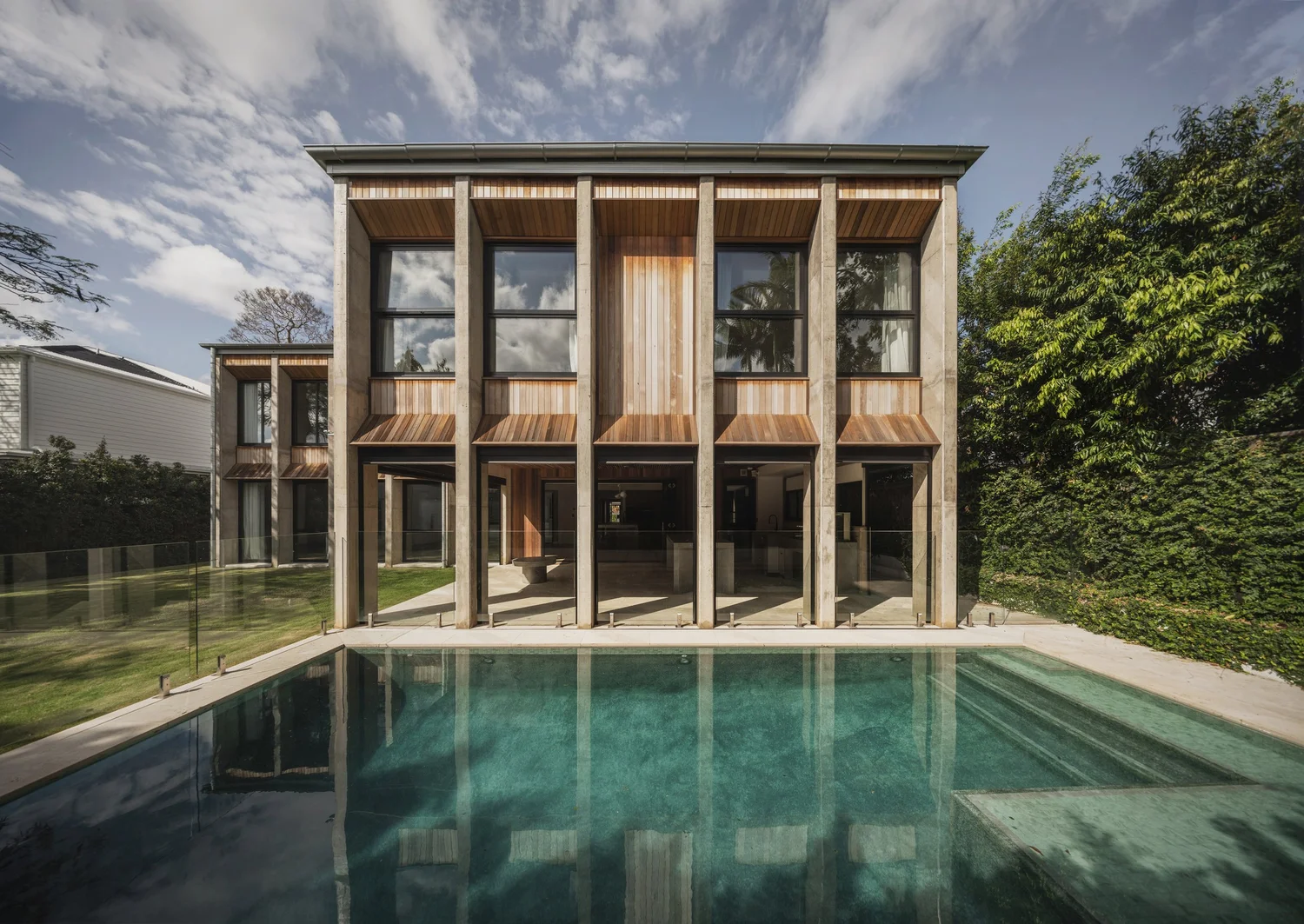 George Kouparitsas Architects Extend Dohori House with Cast-Concrete Volumes Behind Its Preserved Pre-War Facade