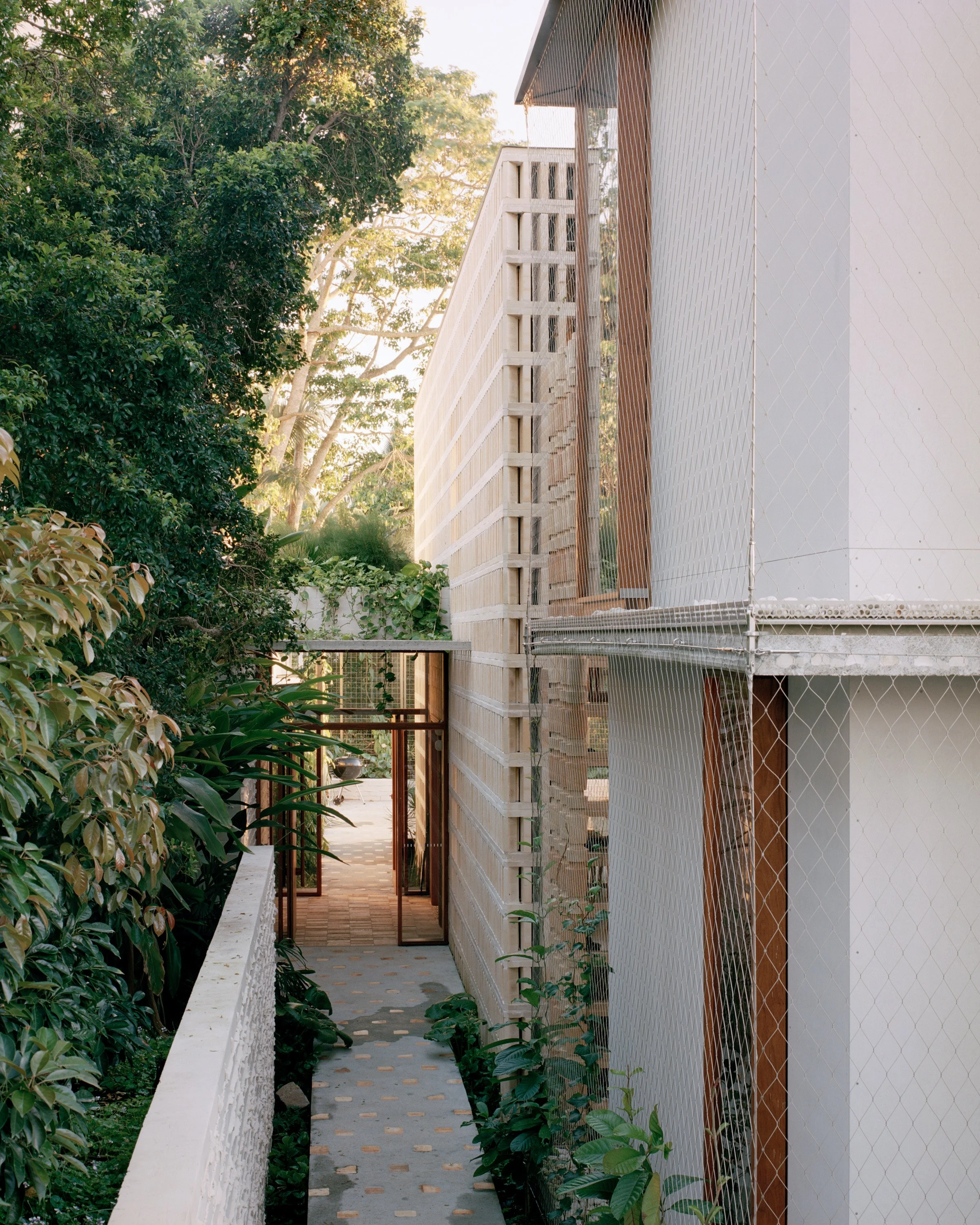 Peter Besley’s Birdwood Residence In Brisbane Crowned By A Ziggurat-like Skylight And Built From Reclaimed Terracotta