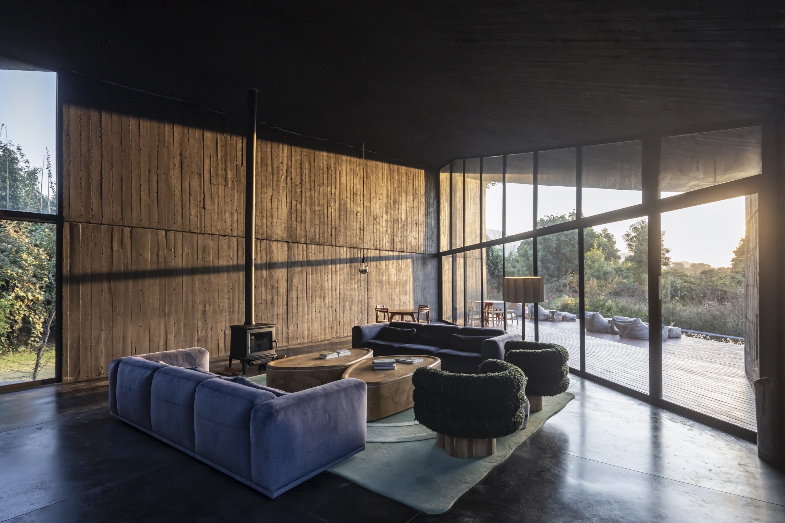 House Mavra: Where Black Concrete Frames The Landscape