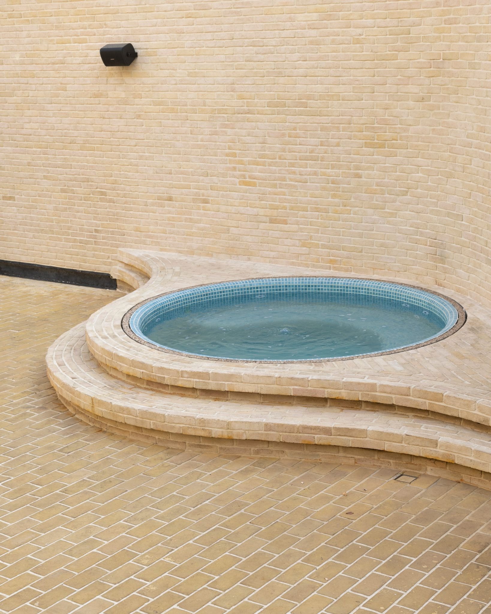 Next Office Bends the Persian Courtyard into the Sky at Lavasan