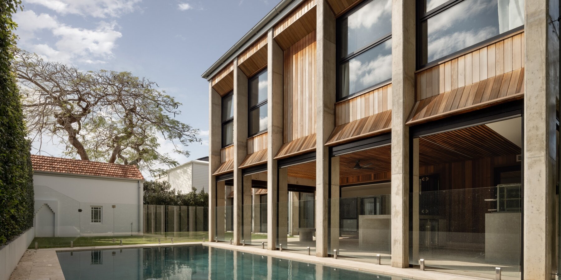 George Kouparitsas Architects Extend Dohori House with Cast-Concrete Volumes Behind Its Preserved Pre-War Facade