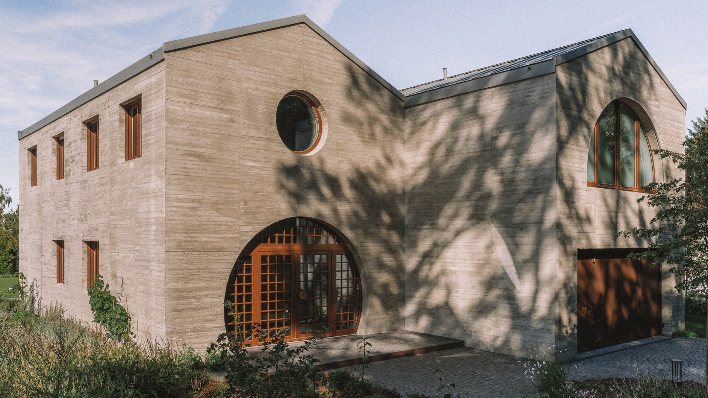 Duplex by Atelier ST: When Two Gables Become One Flowing Home
