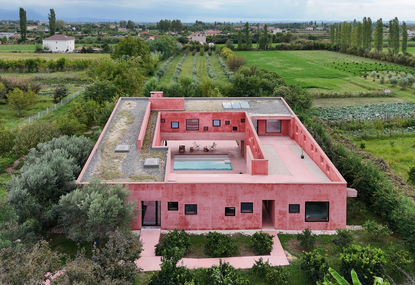 Red House: A Village Dwelling Reimagined For Climate, Community, And Continuity