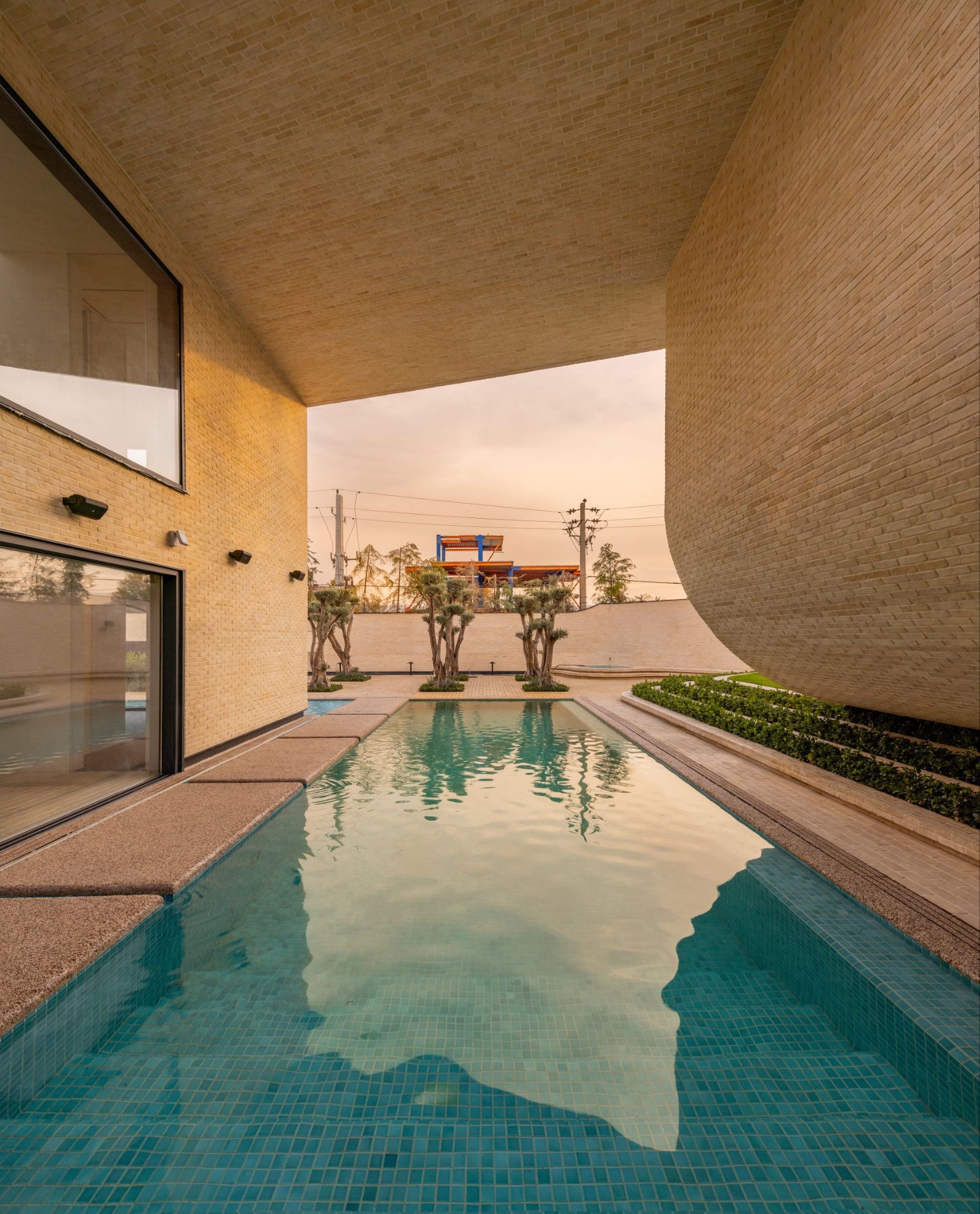 Next Office Bends the Persian Courtyard into the Sky at Lavasan