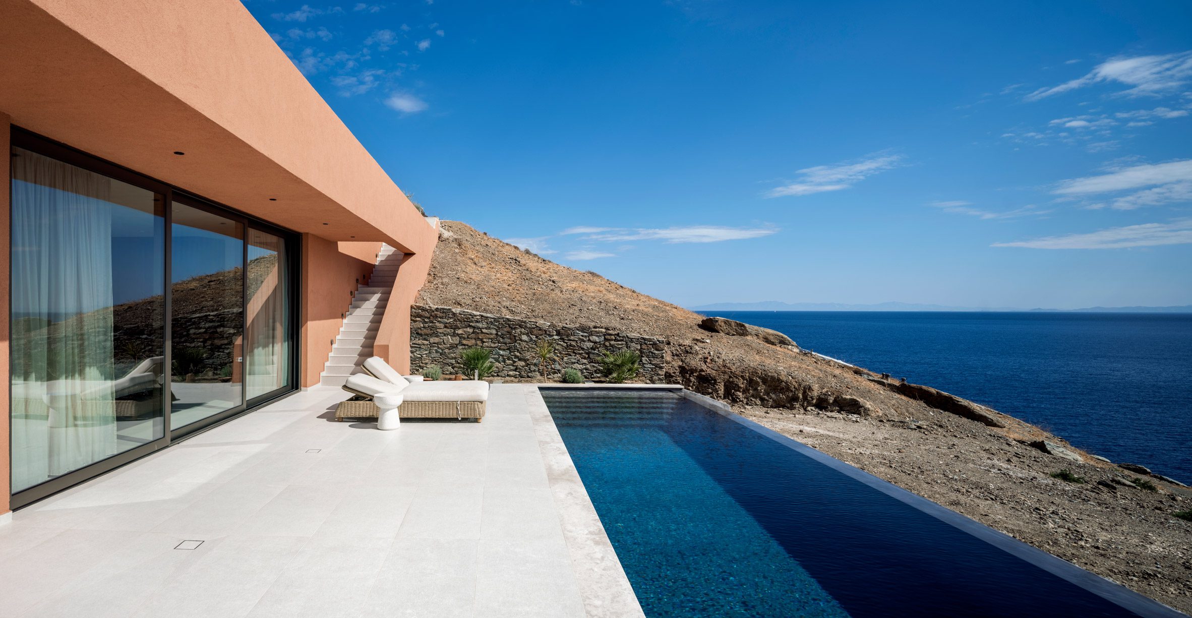Where Stone Meets Sea: Ateno Architecture Studio Buries Olen Resort In Greece’s Rugged Coast