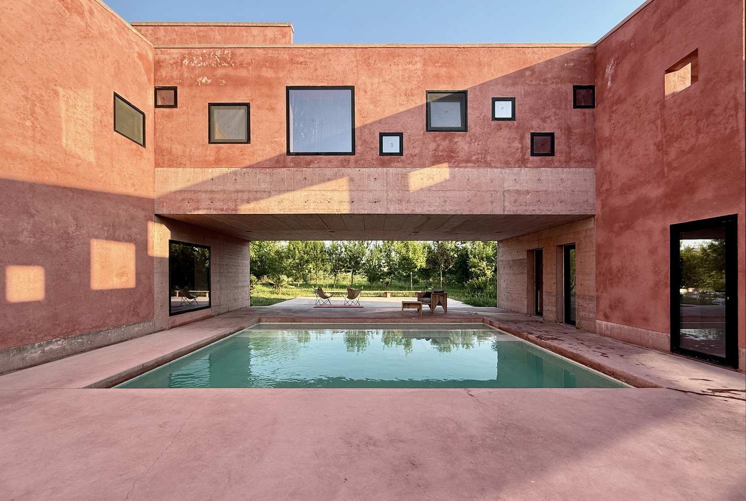 Red House: A Village Dwelling Reimagined For Climate, Community, And Continuity