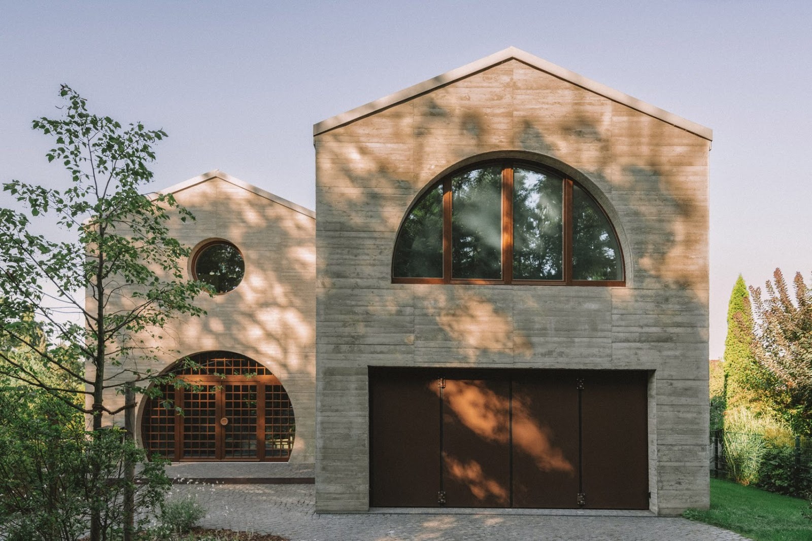 Duplex by Atelier ST: When Two Gables Become One Flowing Home