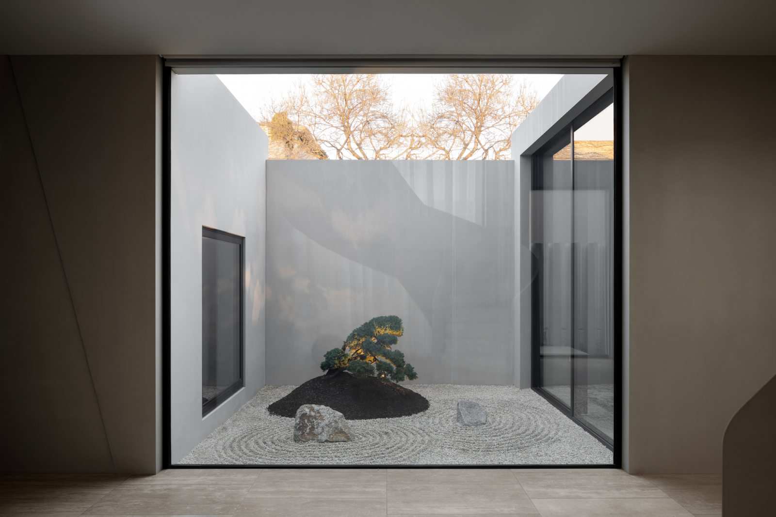 FGR Architects Weave Light and Privacy in Concrete Curtains of the Toorak House