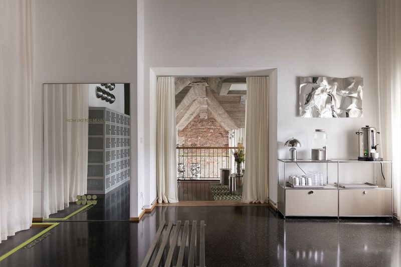Adaptive Reuse Meets Wellness: A Kreuzberg Grain Warehouse Becomes a Reflective Yoga Studio