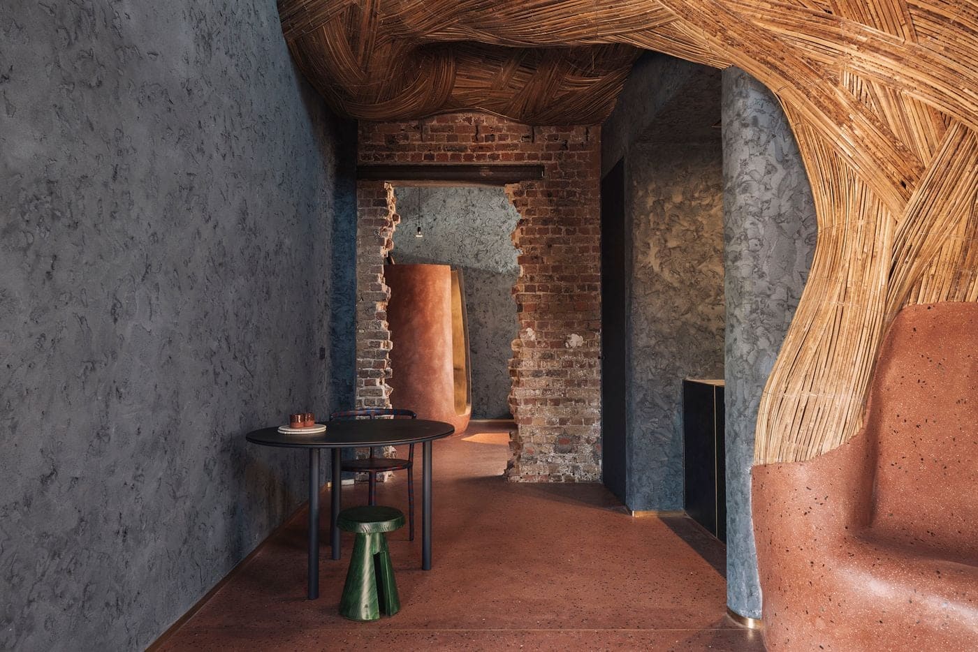 How a Belgian Studio Fused Workshop, Showroom, and Guest Suites in a Bruges Factory