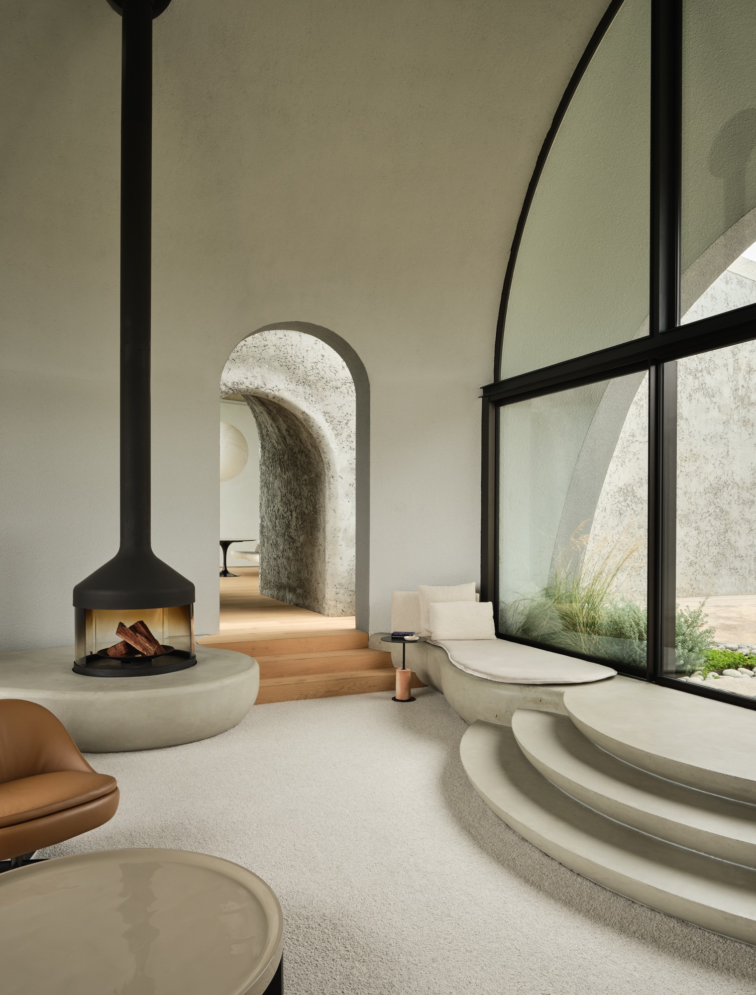 The Concrete Outcrop: Leeton Pointon's House on a Hill Emerges from the Landscape