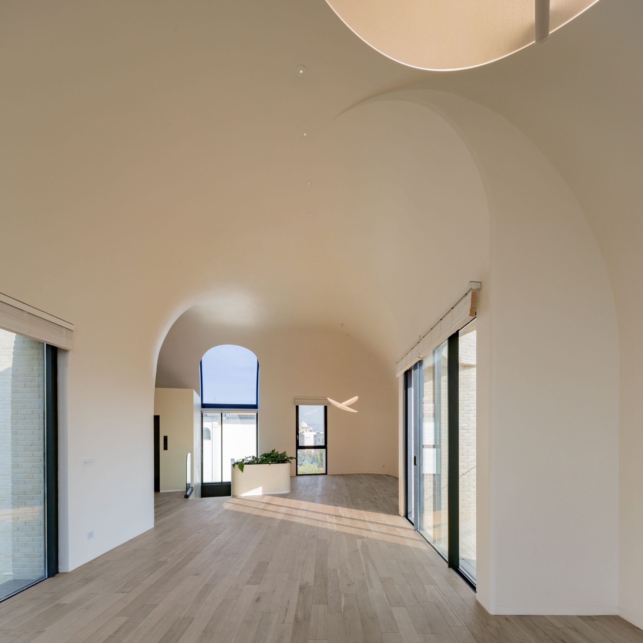 Next Office Bends the Persian Courtyard into the Sky at Lavasan