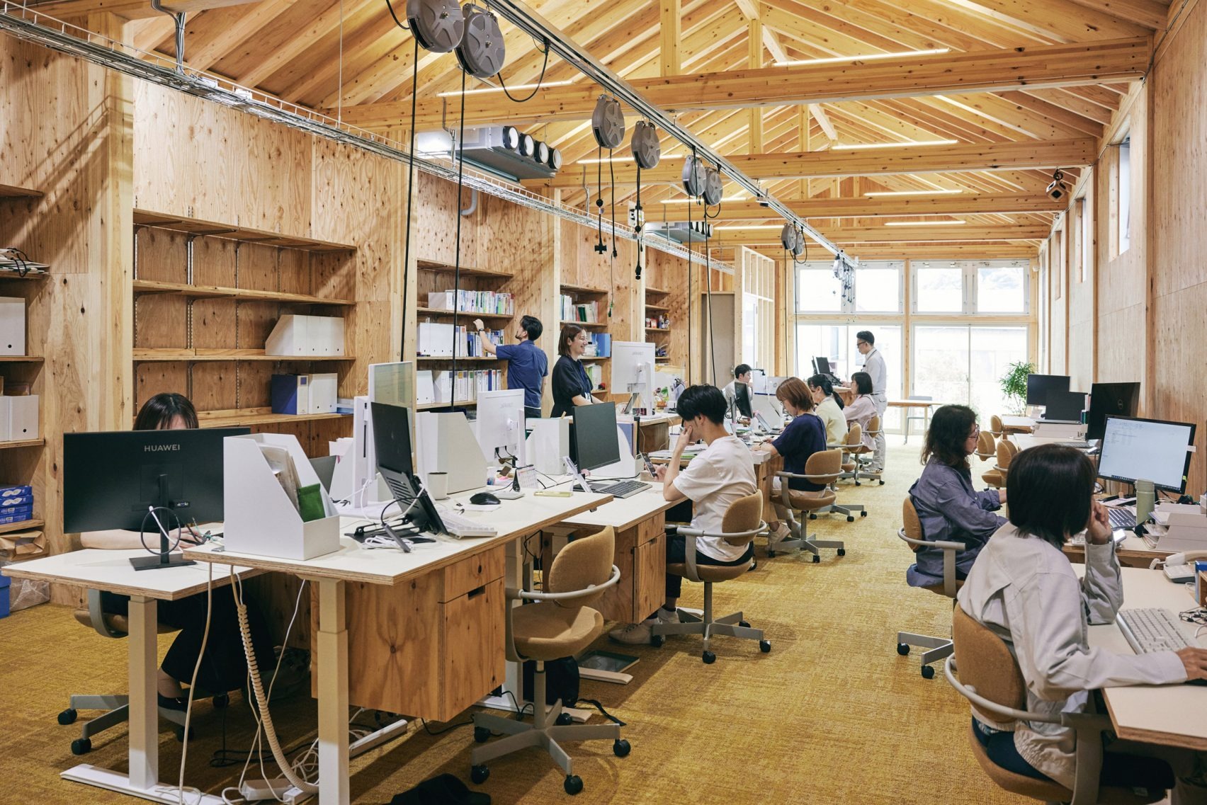 The Poetry of the Ordinary: Schemata Architects Wraps a Rice Dealer in Industrial Elegance