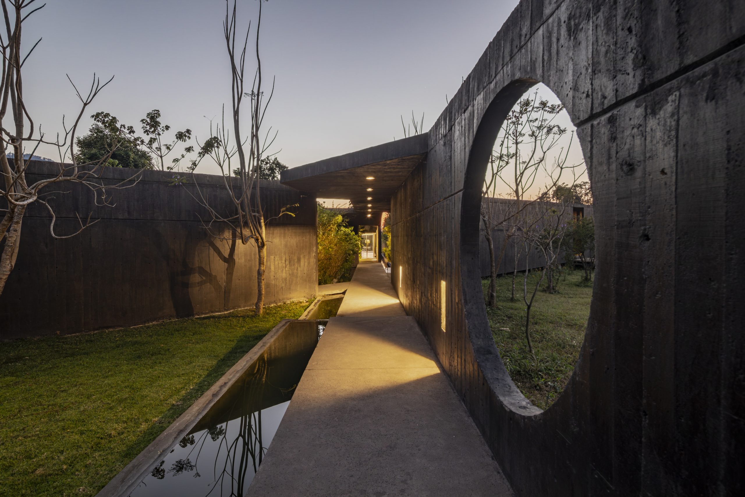 House Mavra: Where Black Concrete Frames The Landscape
