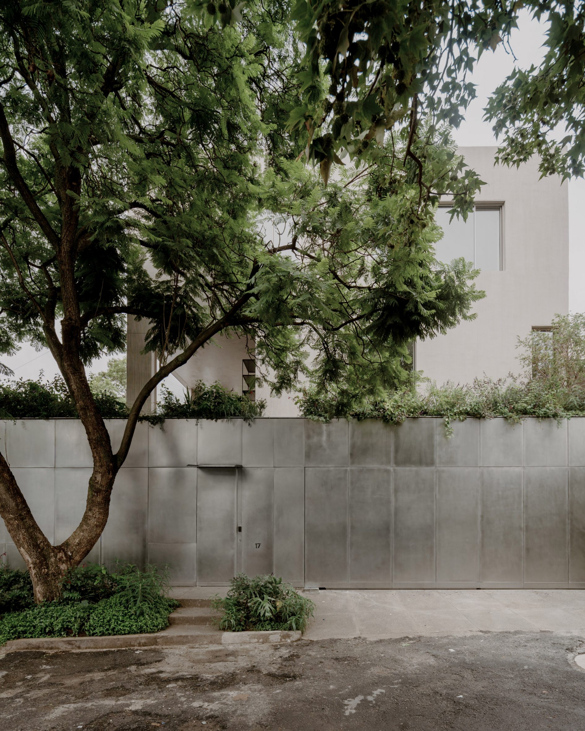 Suspended Gravity: A Concrete House That Refuses To Touch The Ground