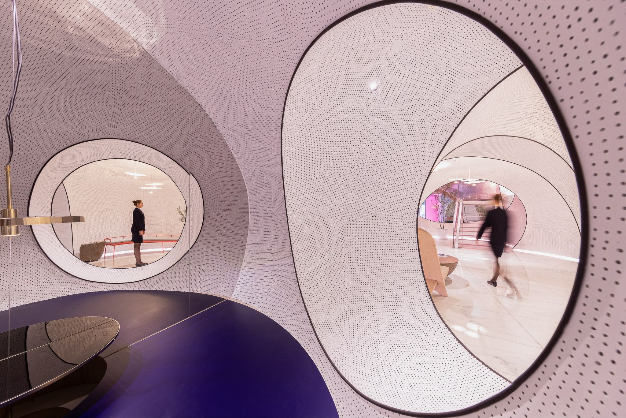 Sonmei Hotel: Where Minimalism Meets Fluid Geometry in Shenzhen's Urban Landscape