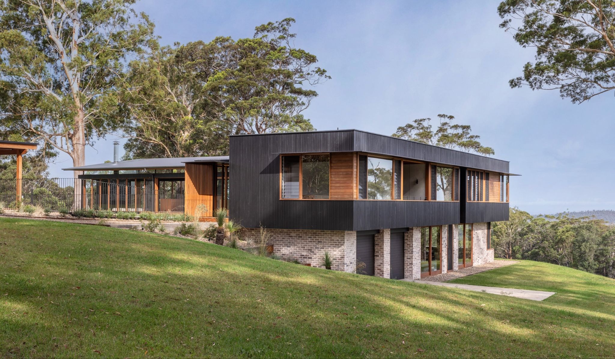 Down South by TF Architects & New View Building Solutions: A Resilient Home Forged in Fire, Forest and Coastal Light