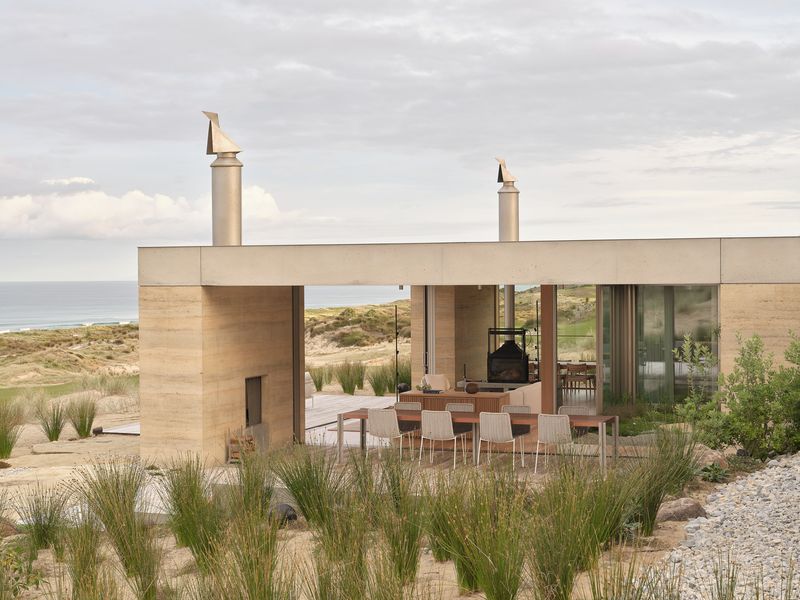 A House Between Horizons: Framing Light, Landscape, And Life Through Dual Courtyards