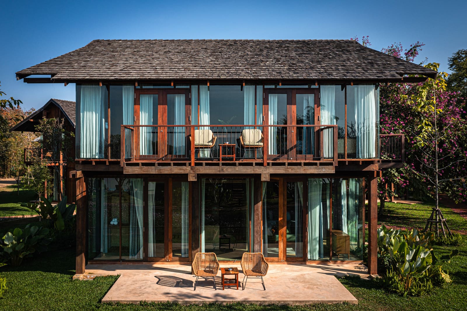 Timber, Earth, and Triangular Courts: A Village-Scale Hotel in Northern Thailand
