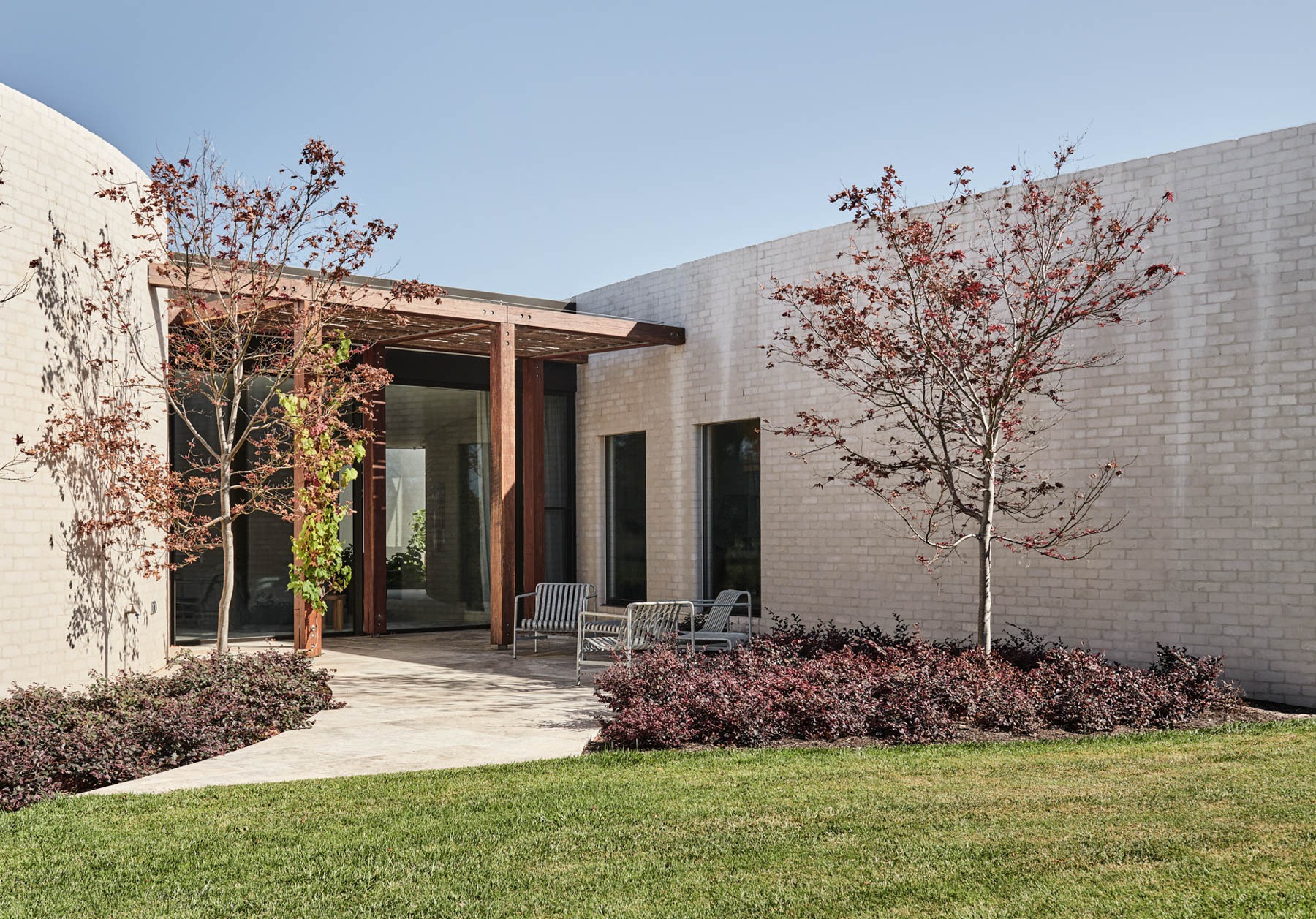 The Concrete Outcrop: Leeton Pointon's House on a Hill Emerges from the Landscape
