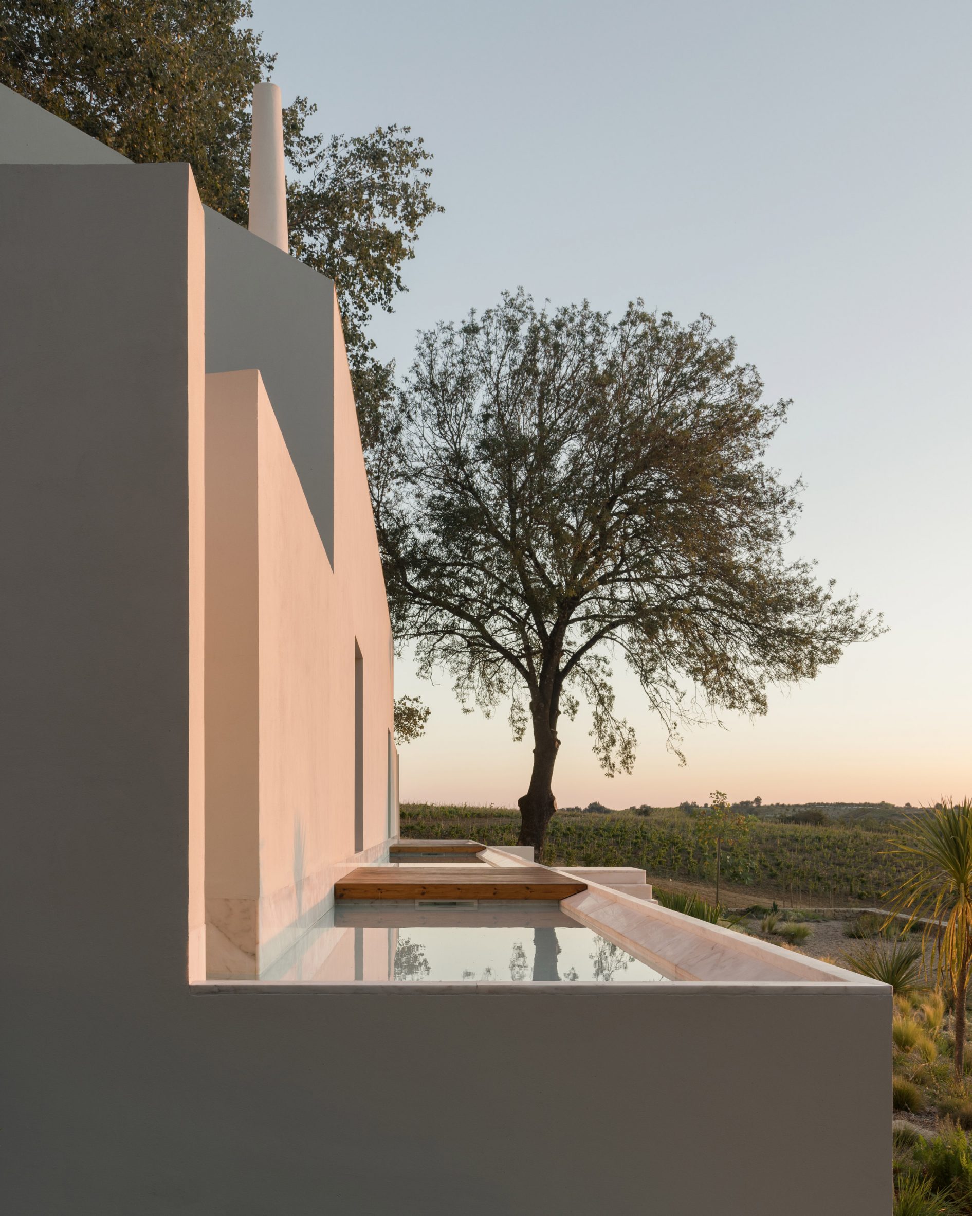 Symmetry In Sound: A Winery Reborn As A Minimalist Home And Studio For Two Musicians