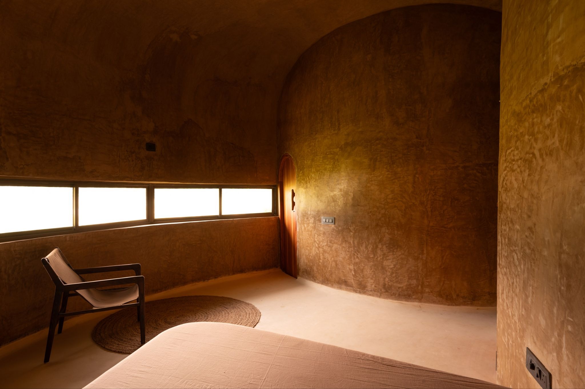 The Wild House by Earthscape Studio: A Living Habitat Carved from Earth and Memory