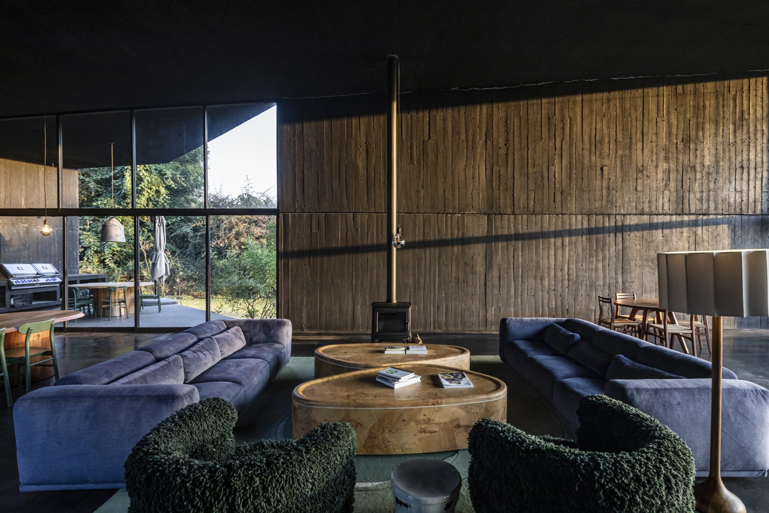 House Mavra: Where Black Concrete Frames The Landscape