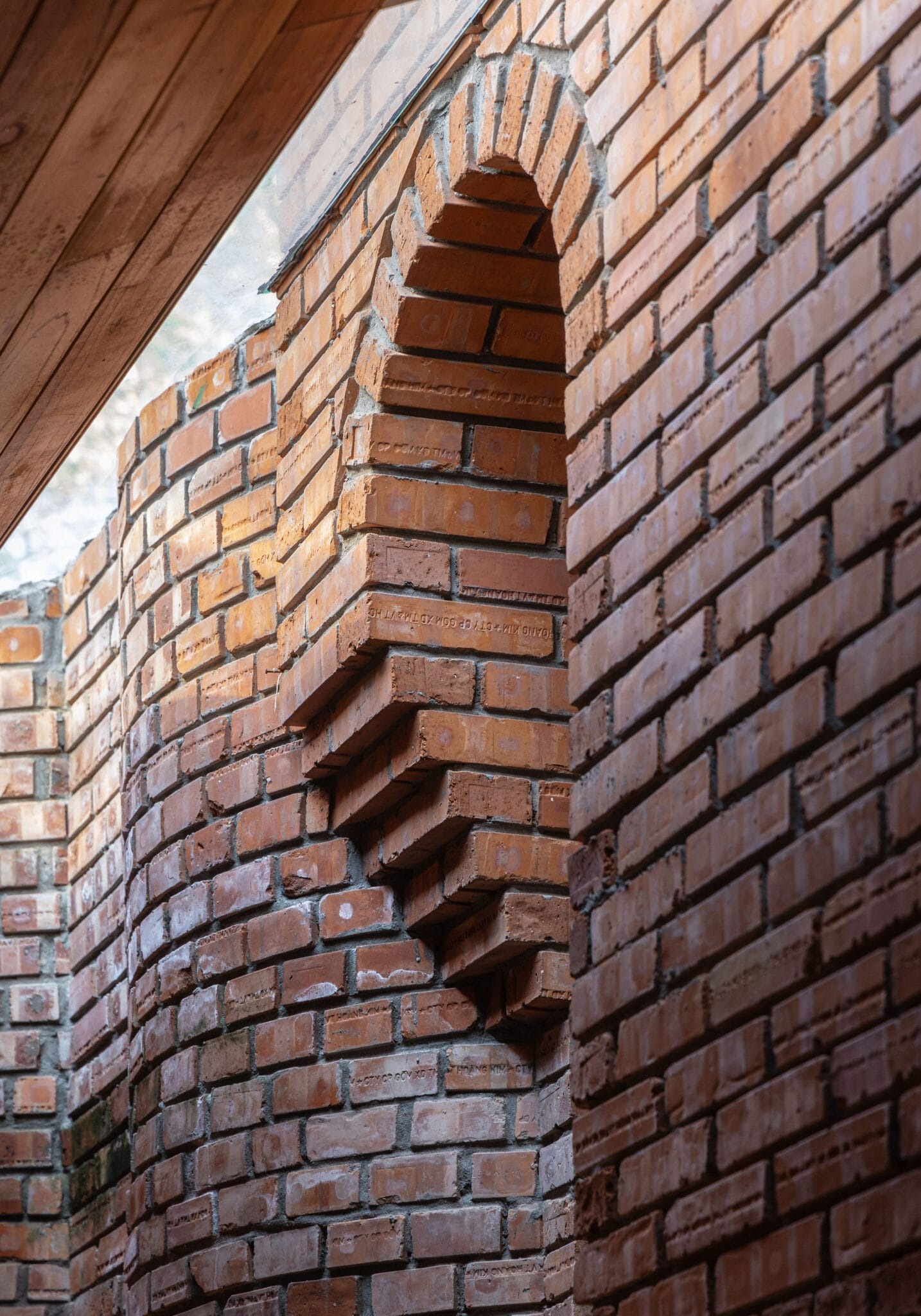Nang House: A Brick Architecture That Breathes with Its Surroundings