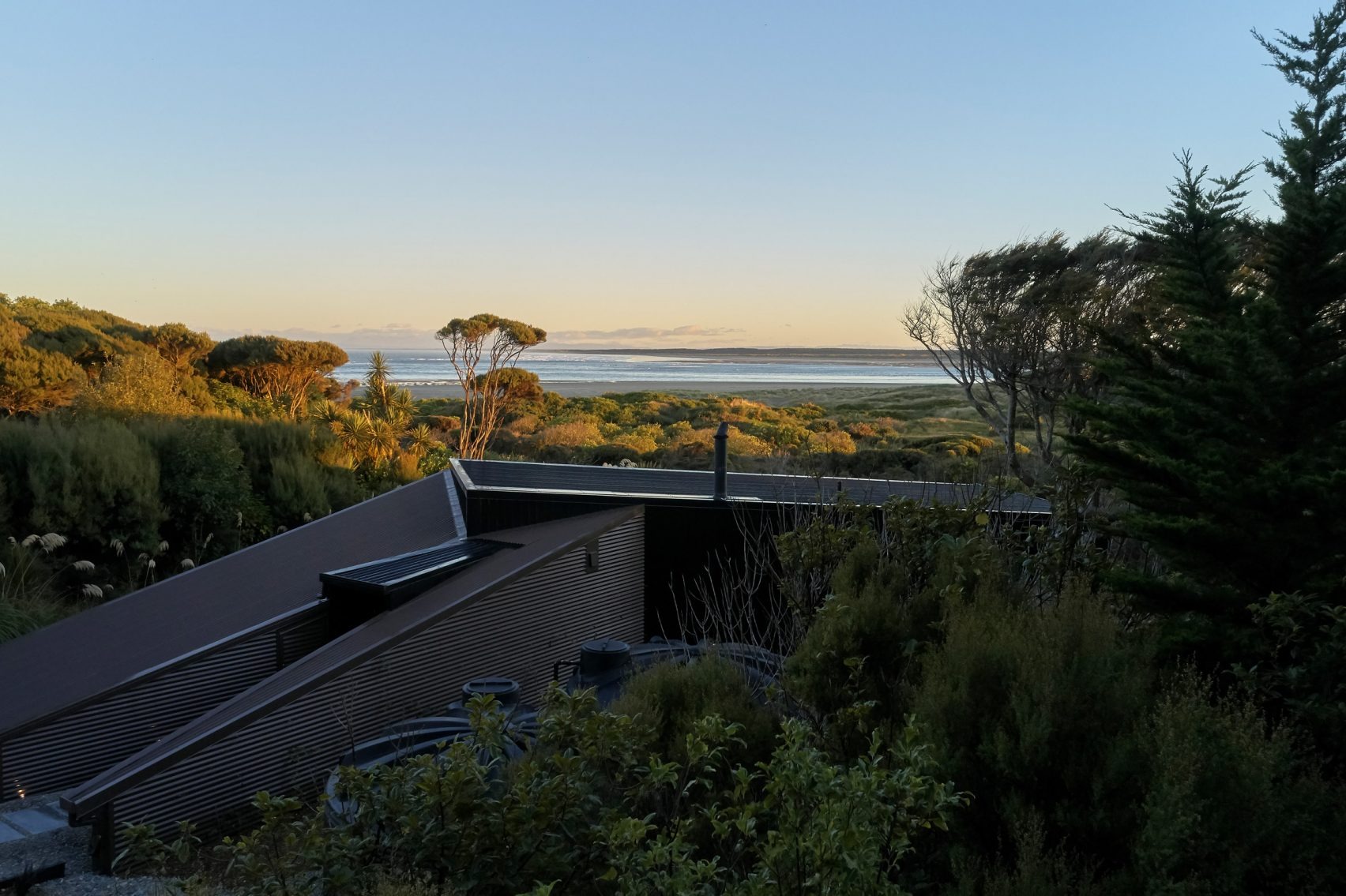 Coast House by Stacey Farrell: Weathered Volumes on New Zealand's Rugged Shoreline