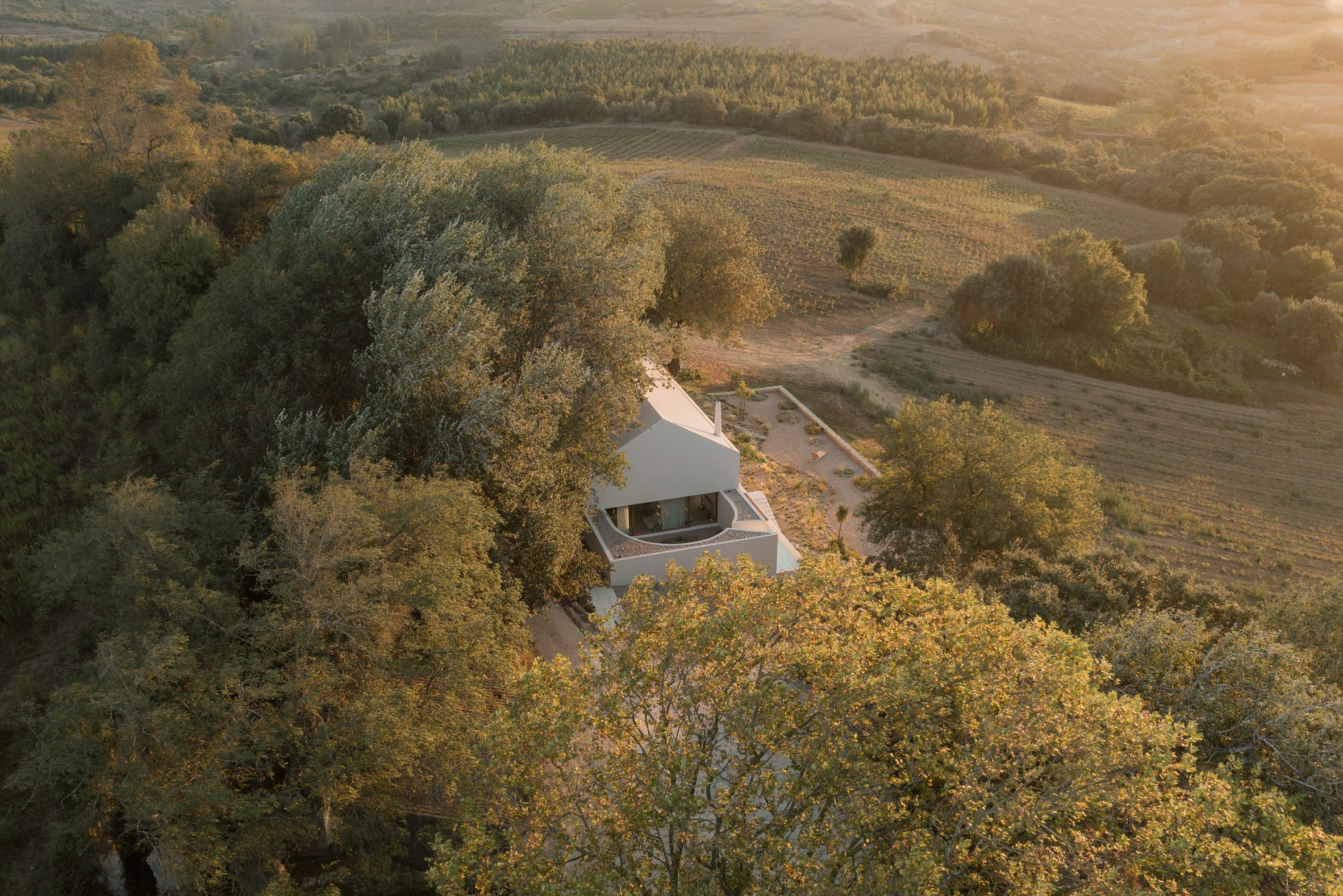 Symmetry In Sound: A Winery Reborn As A Minimalist Home And Studio For Two Musicians