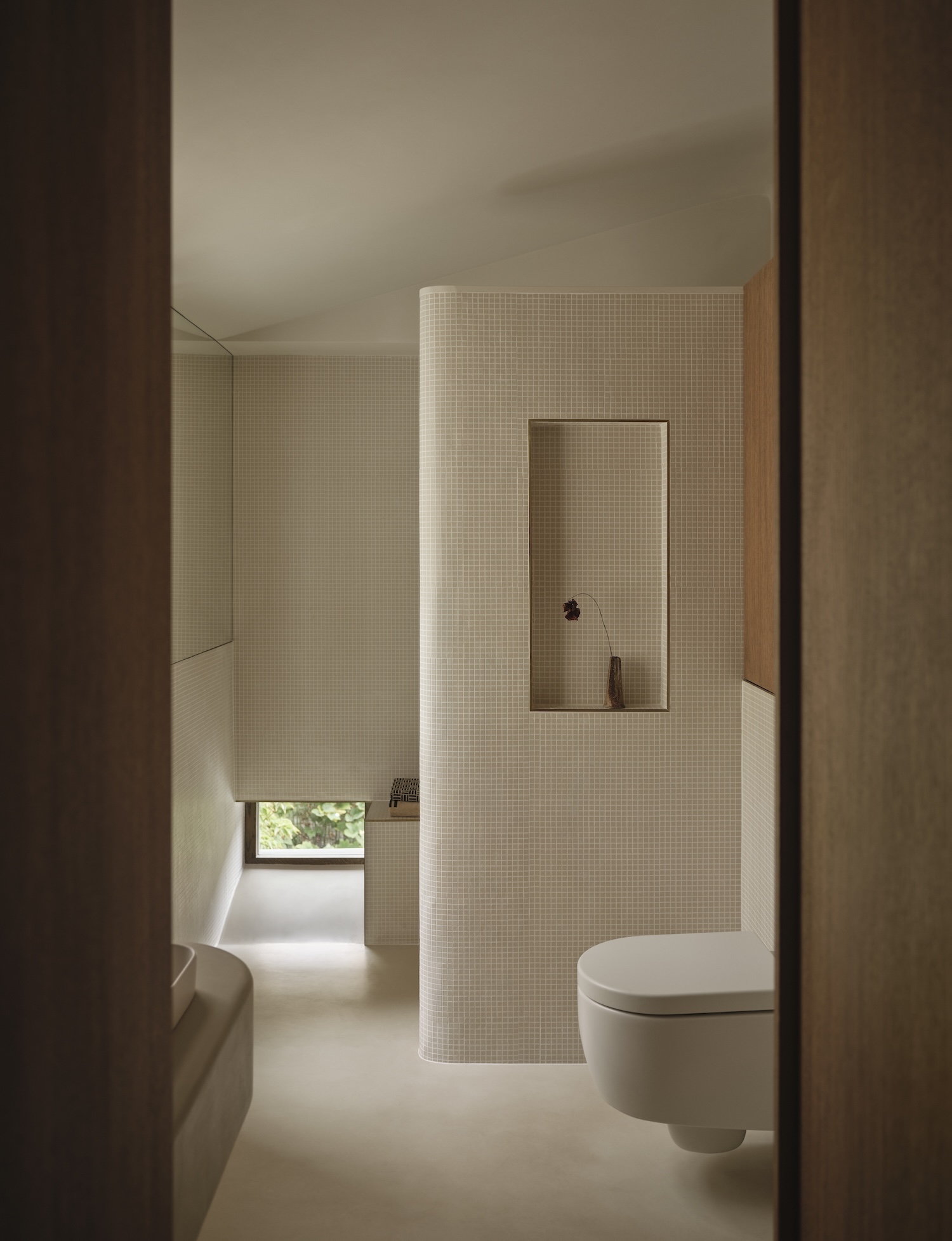 Tectonics Of Stillness: Material Restraint And Spatial Inversion In Heion House