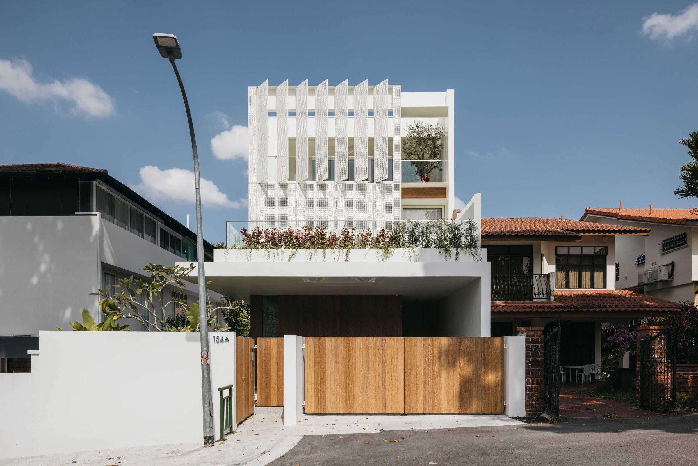 The Wicker House by Ming Architects Weaves Light, Privacy, and Tropical Ease in Singapore