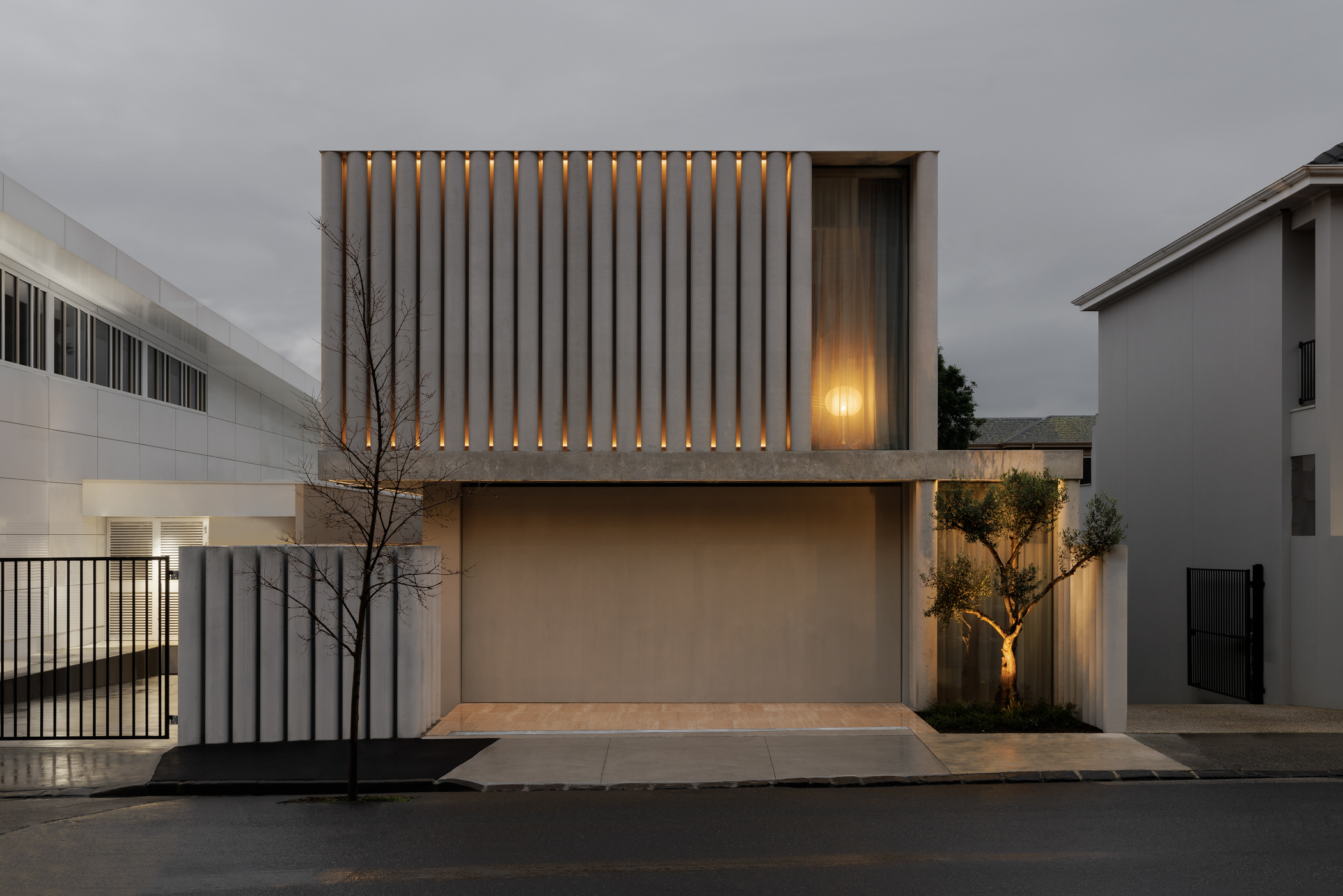 FGR Architects Weave Light and Privacy in Concrete Curtains of the Toorak House