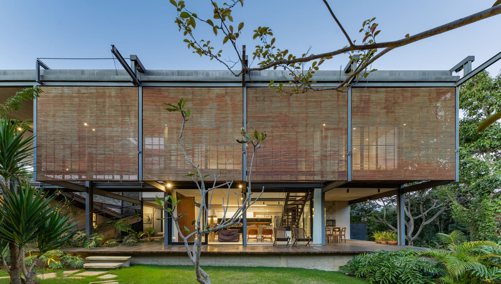 Building on Elevation: How Terrain Shapes Residential Form