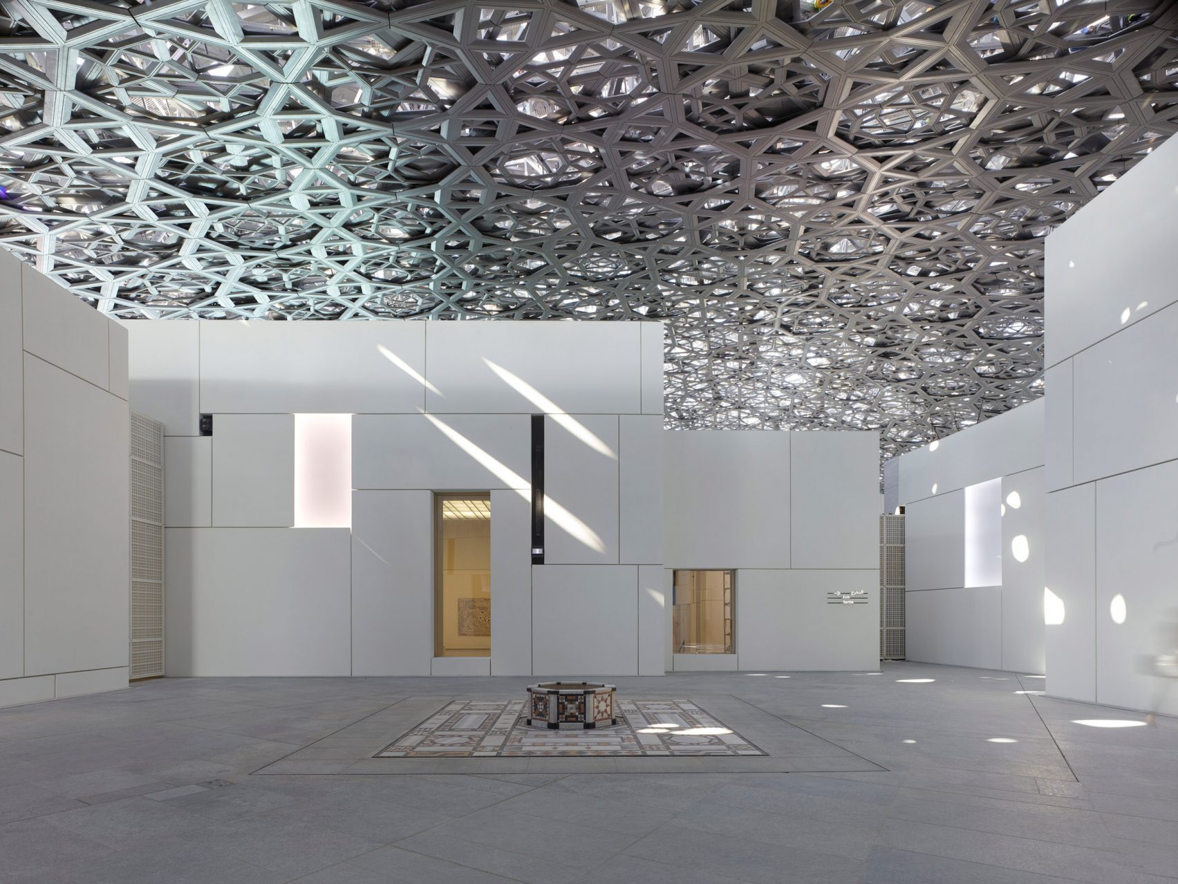 Lessons From The Louvre Abu Dhabi: Iconic Shade As Climate Infrastructure