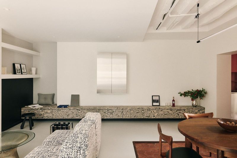 A Parisian Apartment Where Neighborhood Character Becomes Interior Architecture