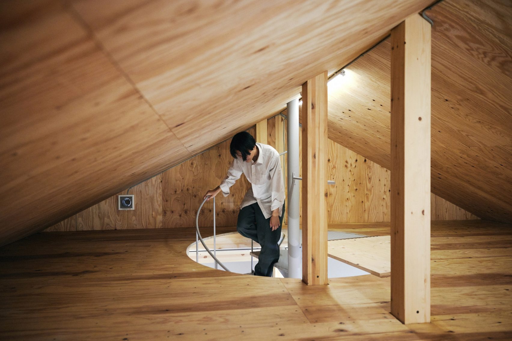 The Poetry of the Ordinary: Schemata Architects Wraps a Rice Dealer in Industrial Elegance