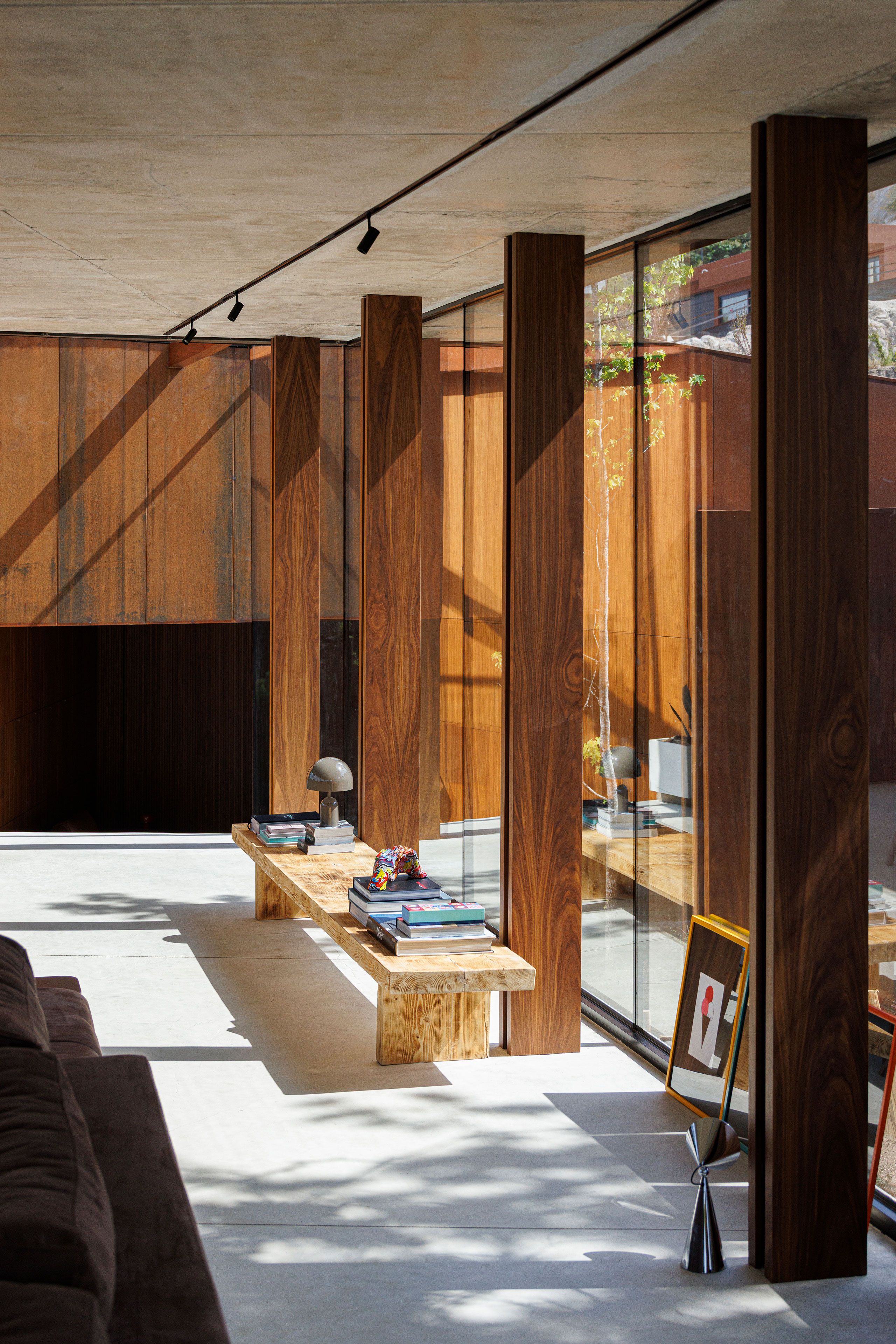 Casa Corten: A Weathered Steel Home That Grows From Portugal’s Hillside